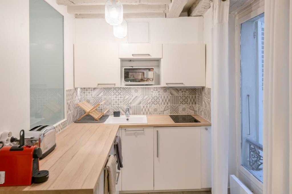 Cosy Appartement En Plein Marais Parijs Buitenkant foto